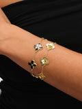 Inicio gold tone diamond cut clover station bracelet, UK version