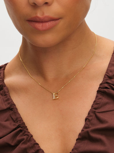 Next Inicio Gold Plated Mother of Pearl E Initial Pendant Necklace- Buy online at McGrocer