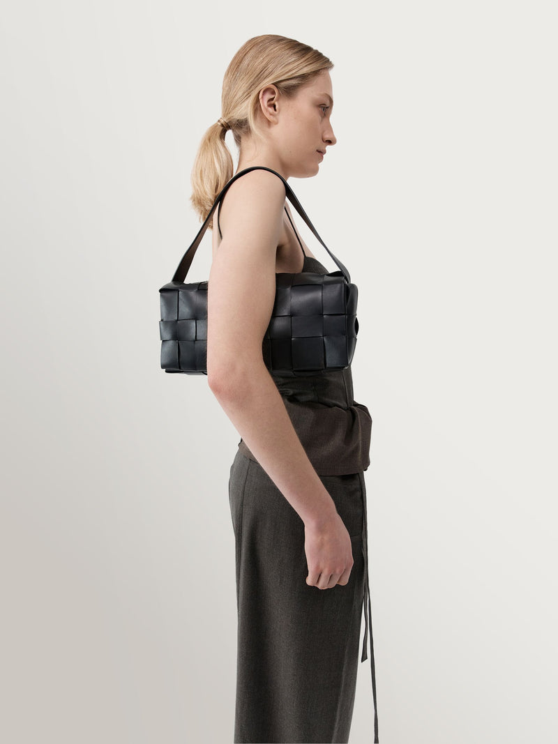 St Agni black woven slim tote, imported from the UK