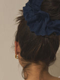 Navy broderie scrunchie with eyelet embroidery, imported from the UK