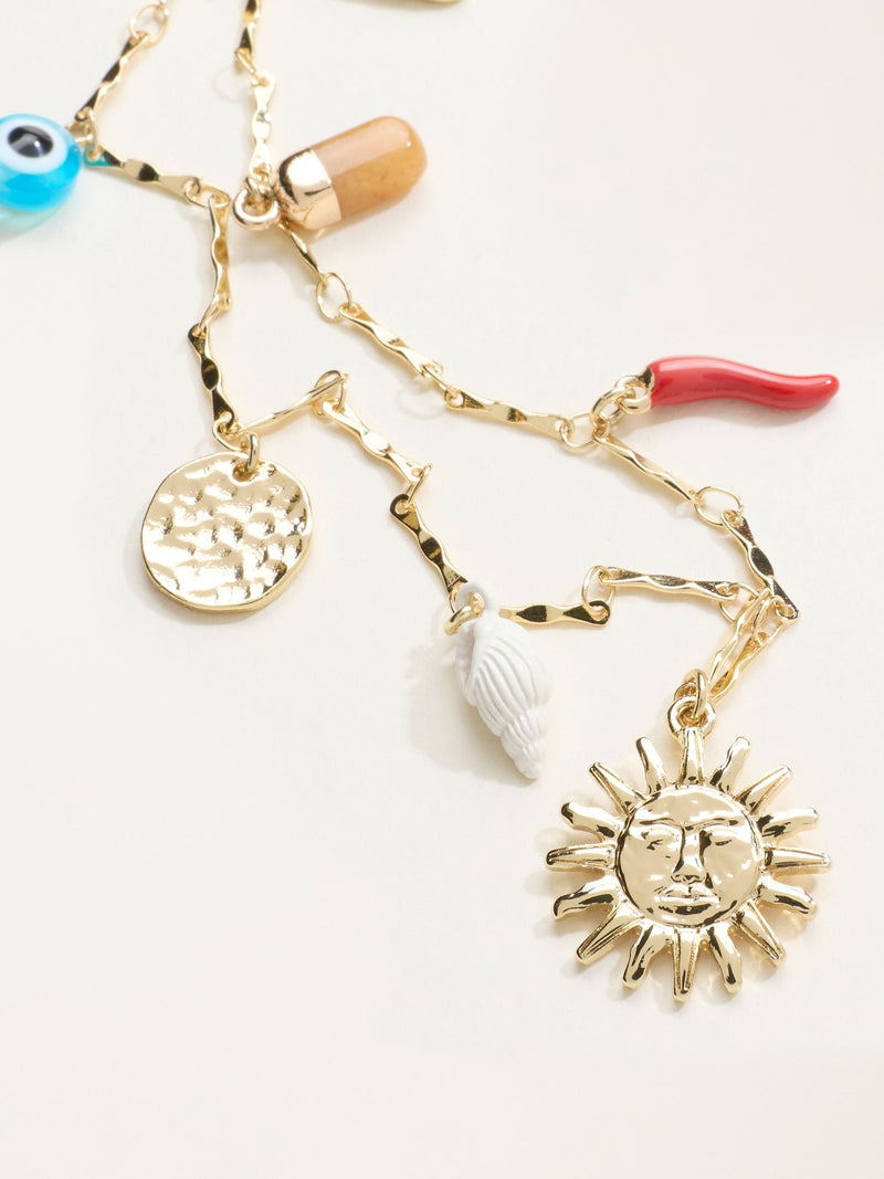 FatFace gold tone sun charm necklace, UK version