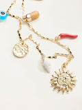 FatFace gold tone sun charm necklace, UK version