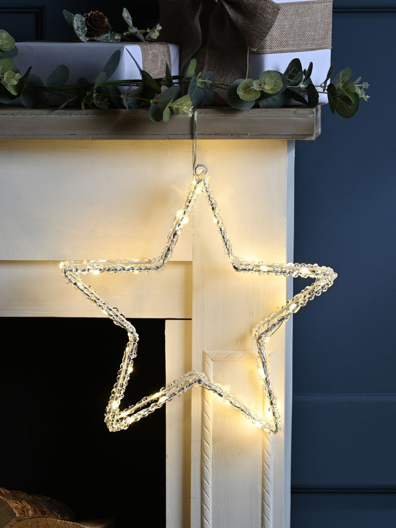 Festive pre lit star light 31cm, imported from the UK