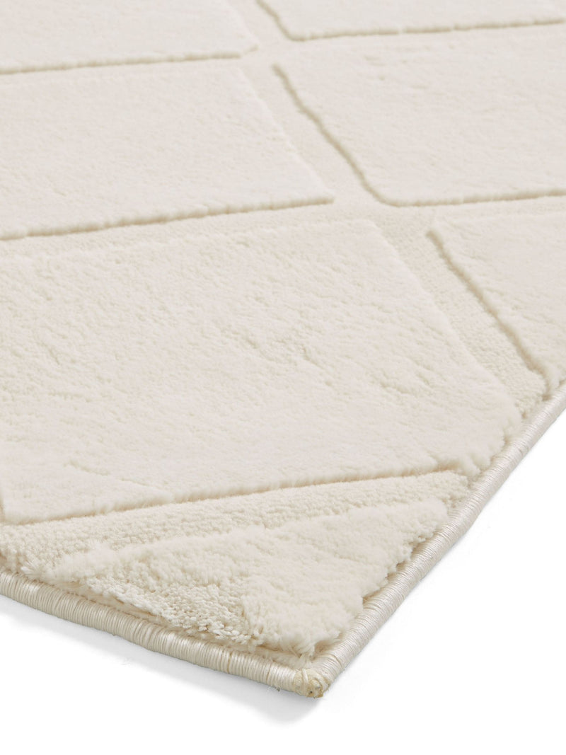 Catherine Lansfield cream cosy diamond washable rug, imported from the UK