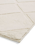 Catherine Lansfield cream cosy diamond washable rug, imported from the UK