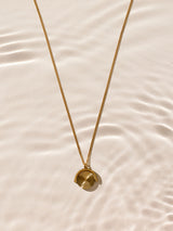 Next Gold Tone Waterproof Stainless Steel Spinner Necklace- Buy online at McGrocer