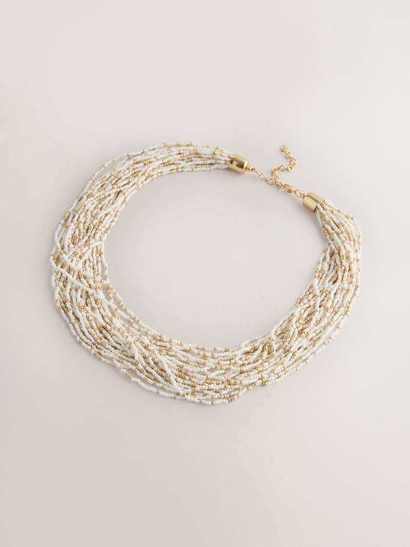 Statement necklace gold tone ecru beads - British product