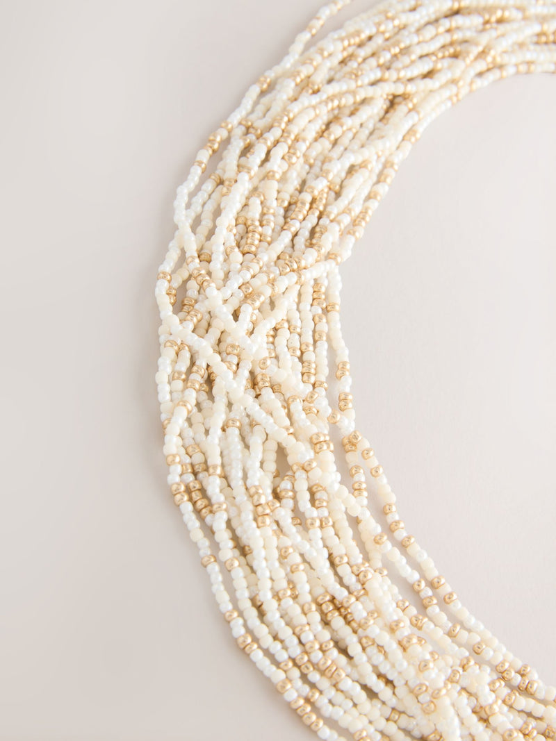 Statement necklace gold tone ecru beads - British product