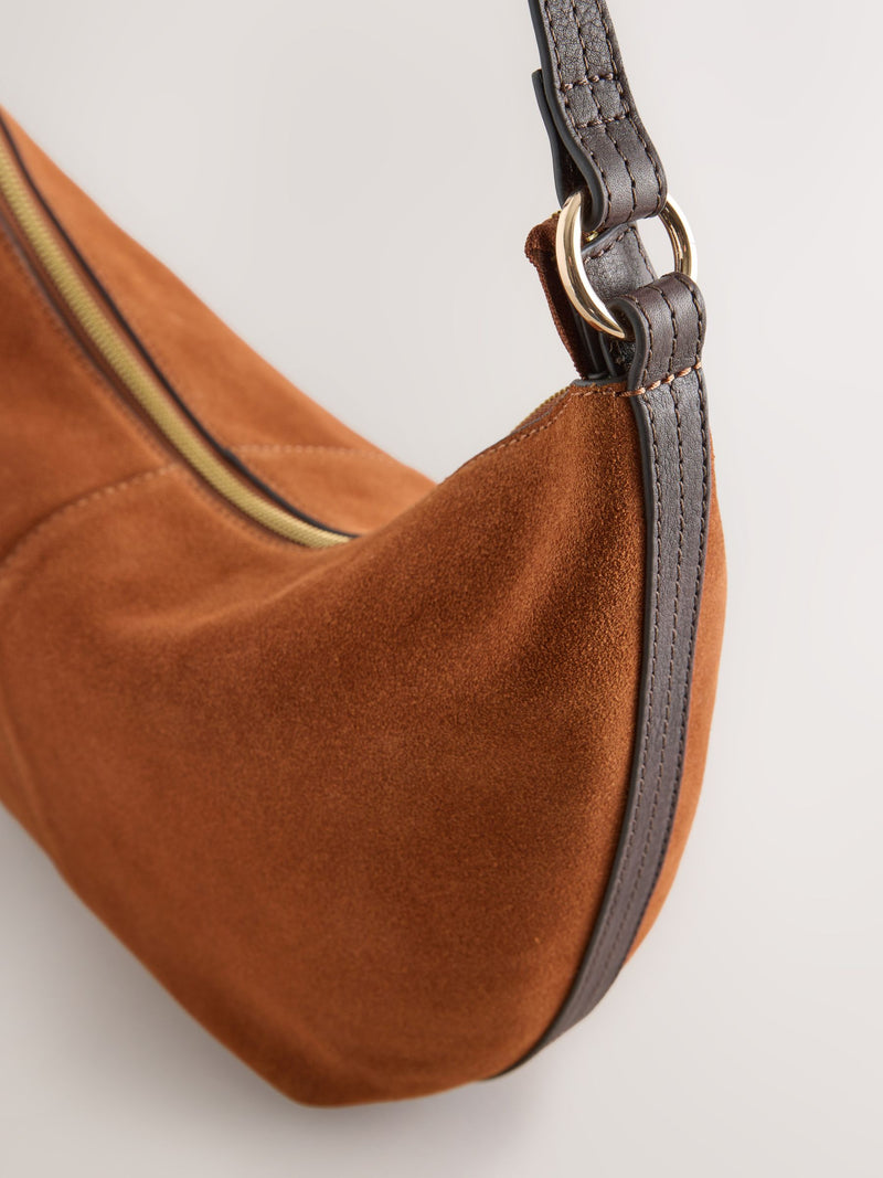 Tan brown suede charm sling bag with tassel, imported from the UK