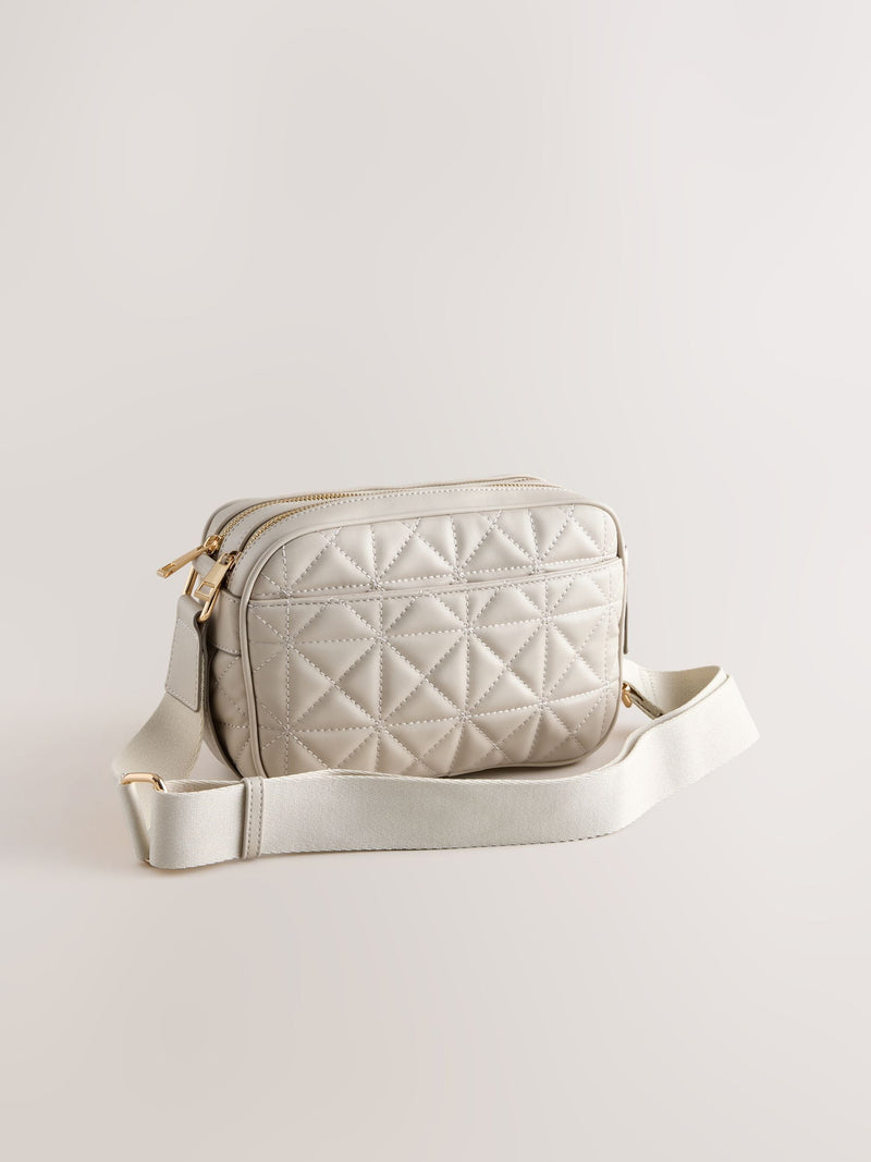 Bone quilted camera bag with adjustable strap (British brand)