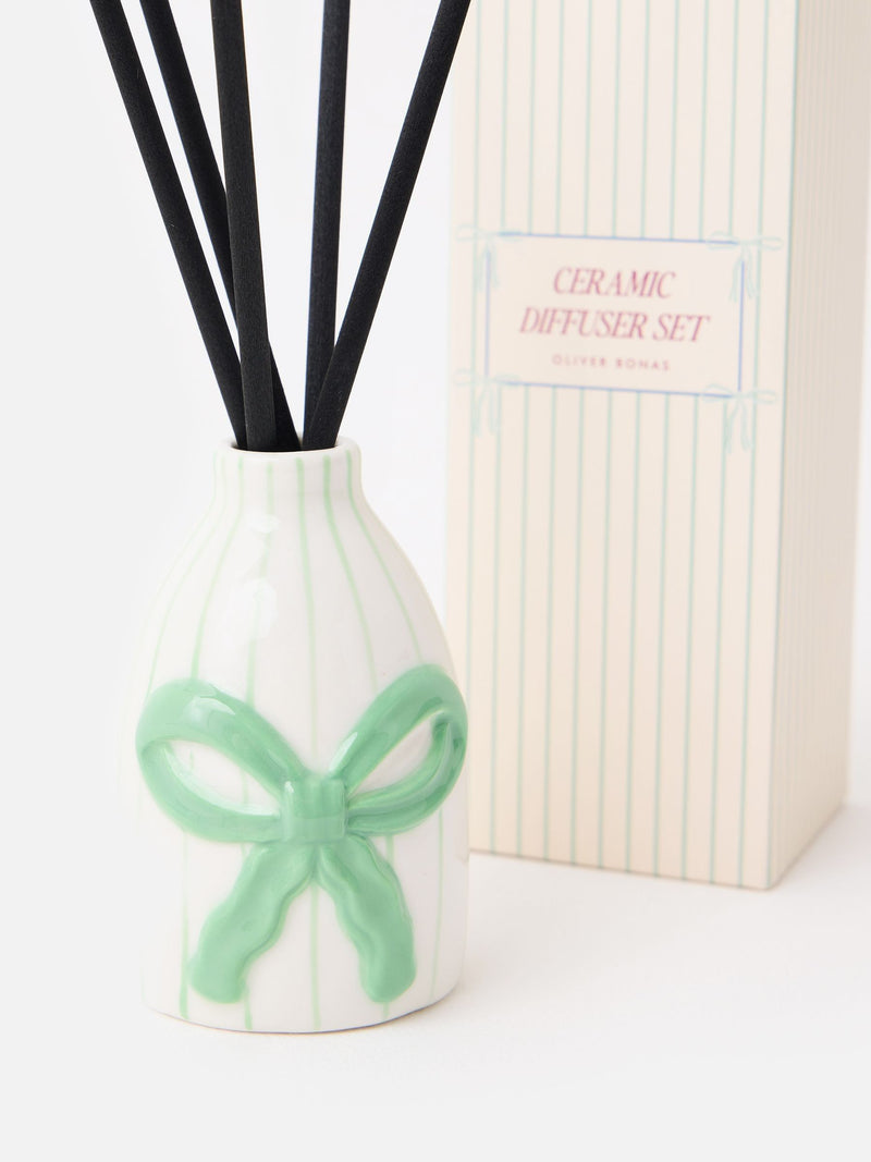 Oliver Bonas cream green striped ceramic reed diffuser, imported from the UK
