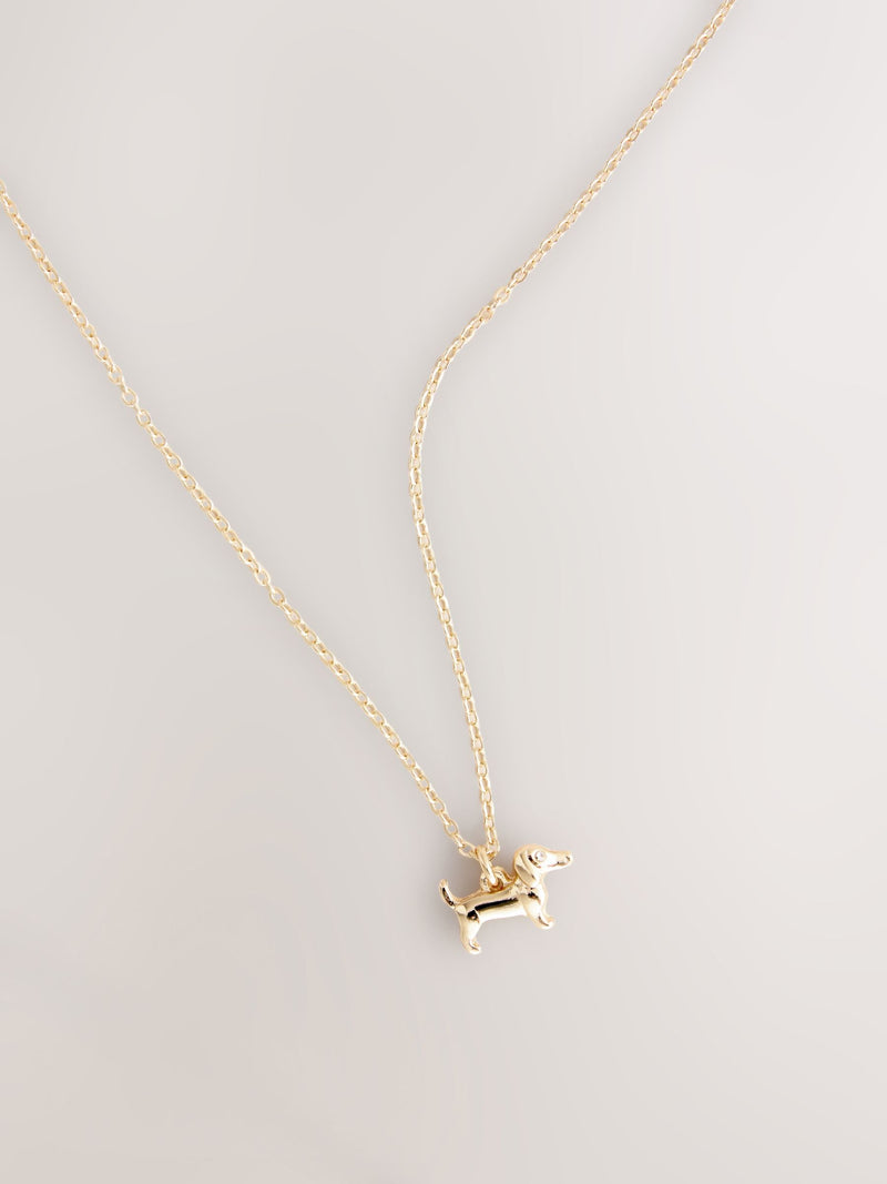 Gold tone sausage dog pendant necklace (British brand)