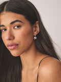 Small hammered disc earrings in silver tone - British product