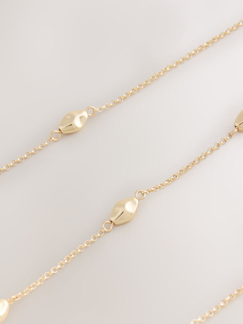 Gold tone rope beaded long necklace, imported from the UK