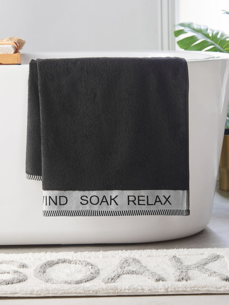 Catherine Lansfield Black Relax and Unwind towel collection (British brand)