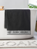 Catherine Lansfield Black Relax and Unwind towel collection (British brand)