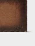 Osprey London brown hand-burnished leather coin pocket wallet, imported from the UK