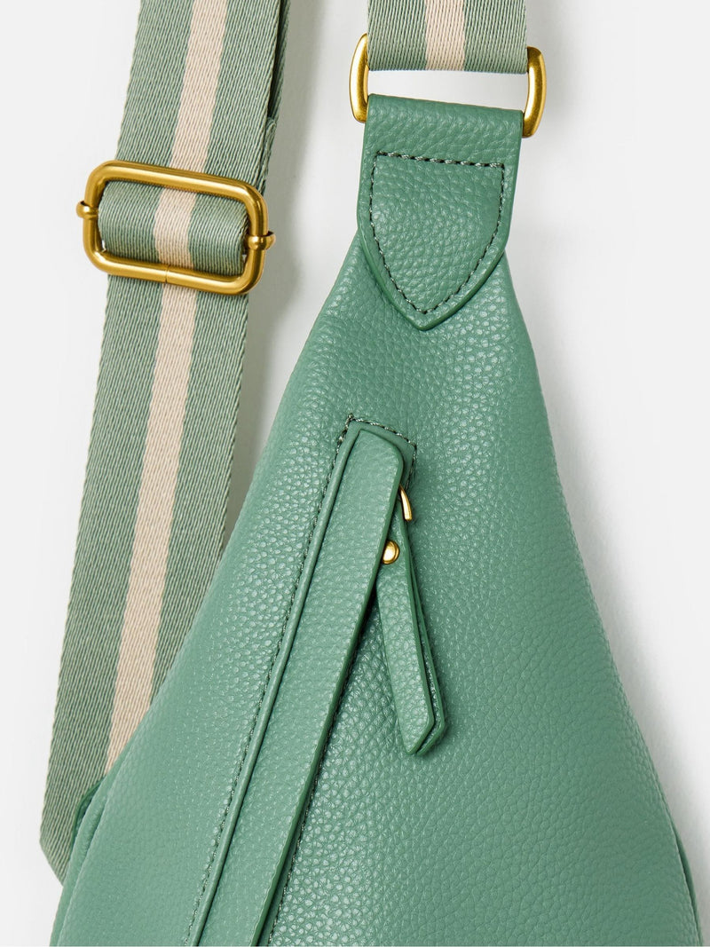 Oliver Bonas sage green belt bag, imported from the UK