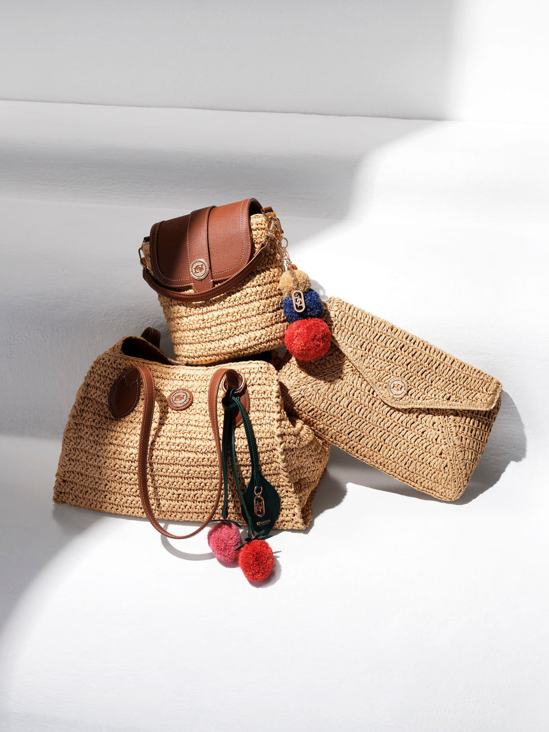 Dune London Dimple cross-body bag in synthetic raffia (British brand)