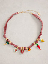 Next White Stuff Pink Scarf Charm Necklace- Buy online at McGrocer
