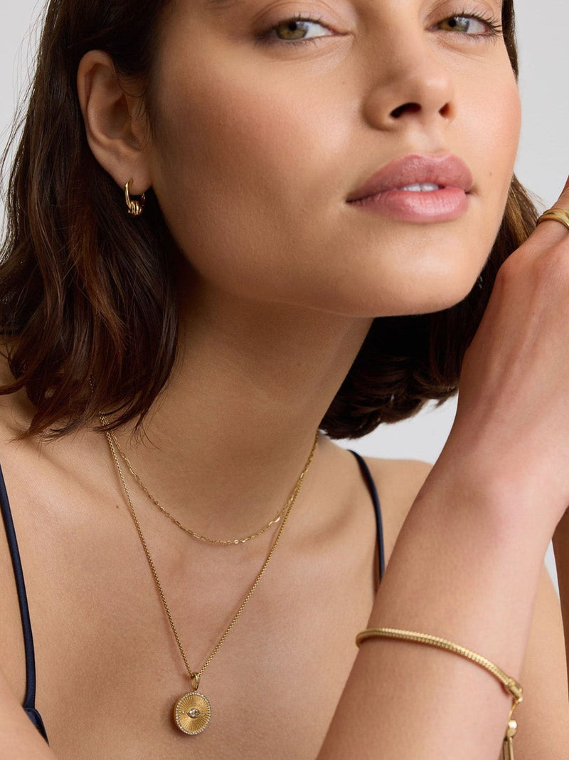 D.LOUISE gold tone waterproof knot twist mini hoops (British brand)