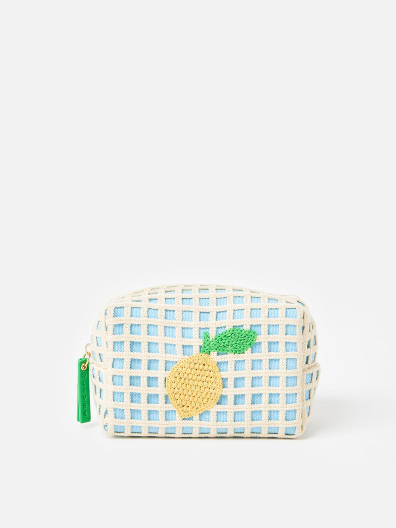 Oliver Bonas blue crochet makeup bag with lemon motif (British brand)