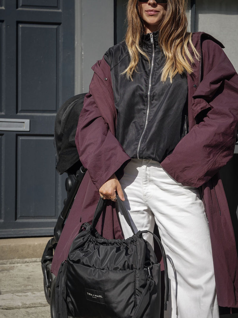 Tiba + Marl Black Luna drawstring changing tote - British product