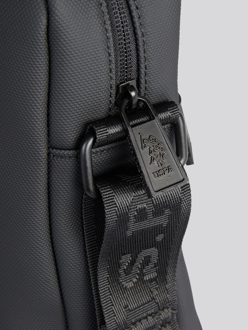 U.S. Polo Assn. black arrowhead cross-body bag, imported from the UK