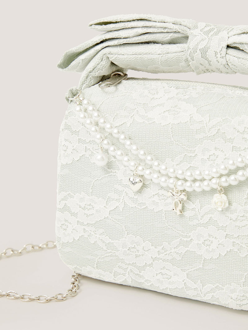 Monsoon green lace bag with pearl charms, imported from the UK