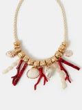 Accessorize coral reef necklace with real seashells and beads (British brand)