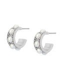 AllSaints silver tone pearl huggie earrings with stainless steel posts, imported from the UK