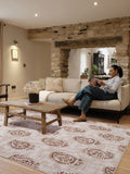 Hug Rug rust woodblock paisley rug, UK version