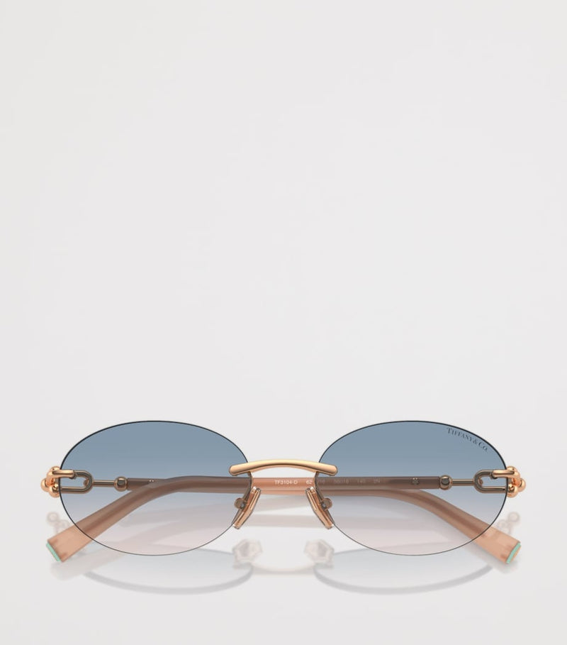 Tiffany & Co. rimless oval sunglasses with gold-tone temples, UK version