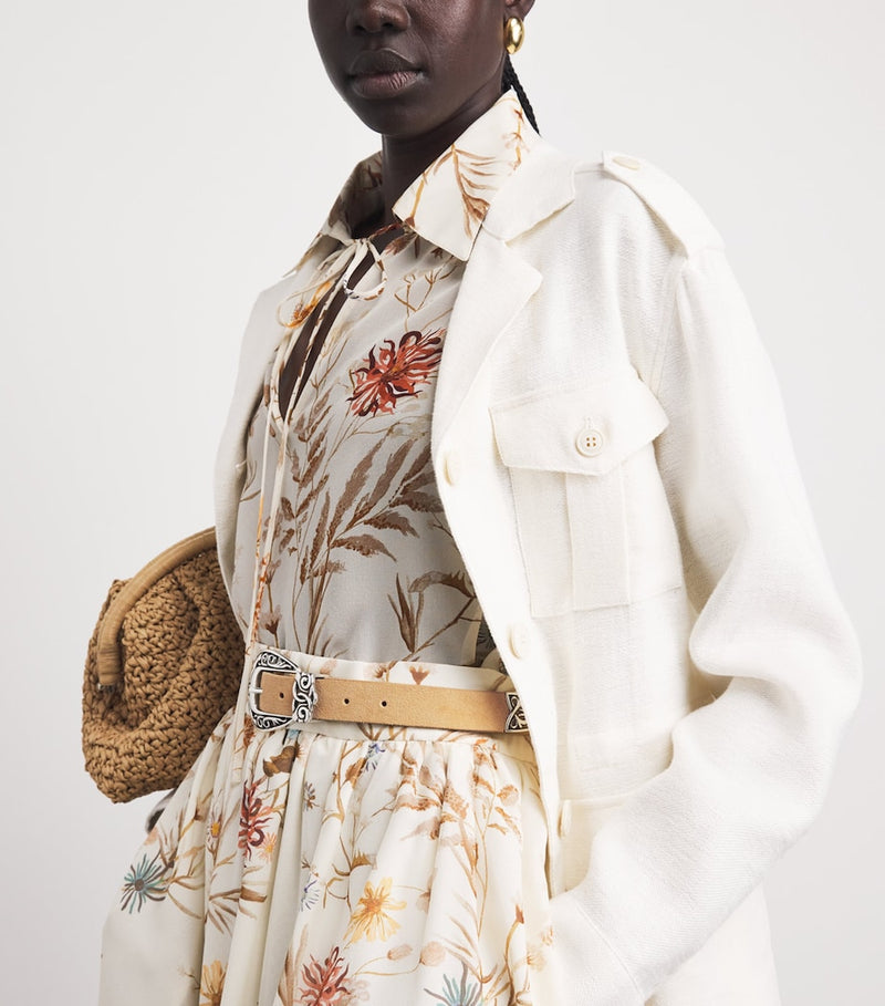 Eleventy suede belt with Western-style buckle, imported from the UK