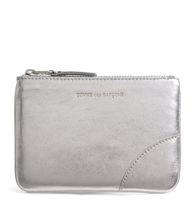 Comme Des Garçons Wallet small leather pouch silver, UK version