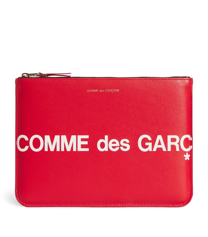 Comme des Garçons large leather logo pouch, UK version