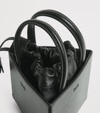 Talel leather triangle top-handle bag - British product