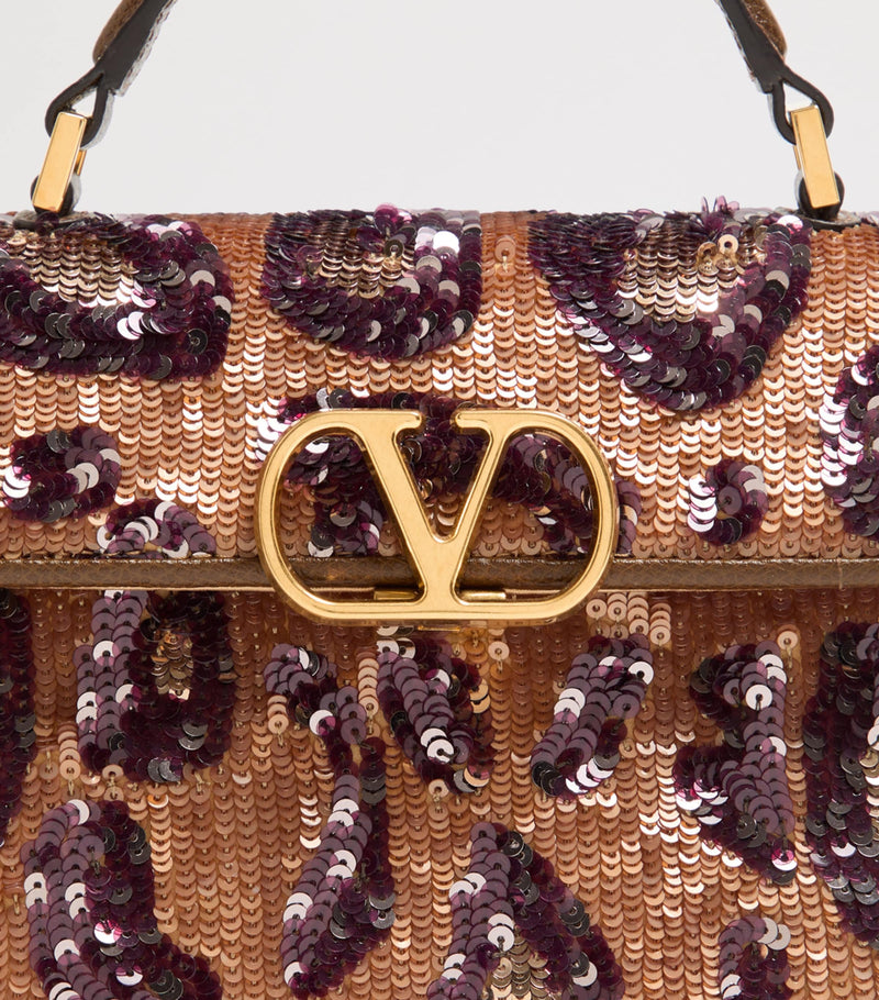 Valentino Garavani mini silk embellished VSLING top-handle bag, UK version