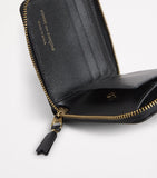 Comme des Garçons polka-dot calfskin wallet (British brand)