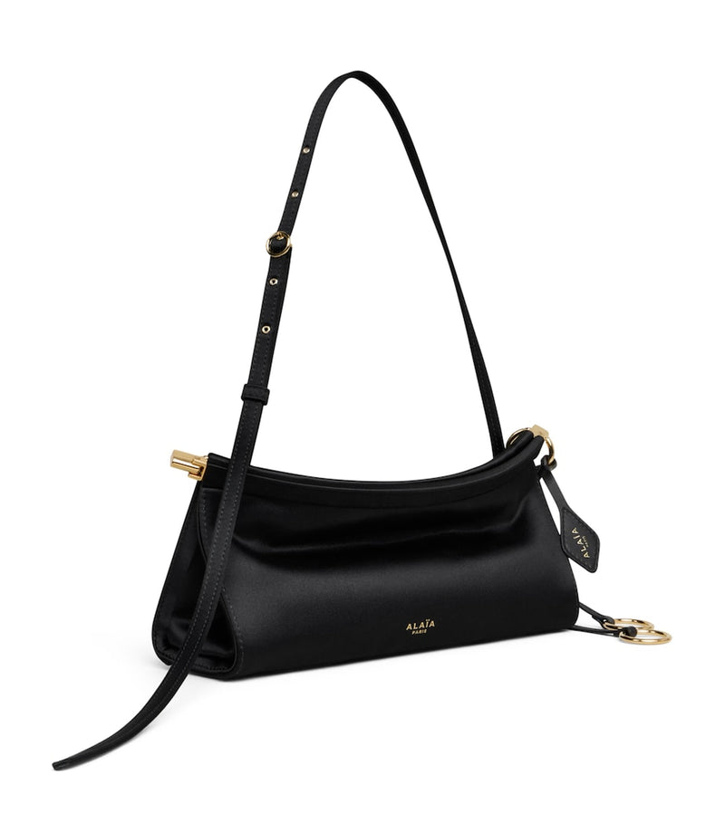 Alaïa small satin Le Click shoulder bag - British product
