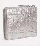 Comme des Garçons wallet embossed logo zip, imported from the UK