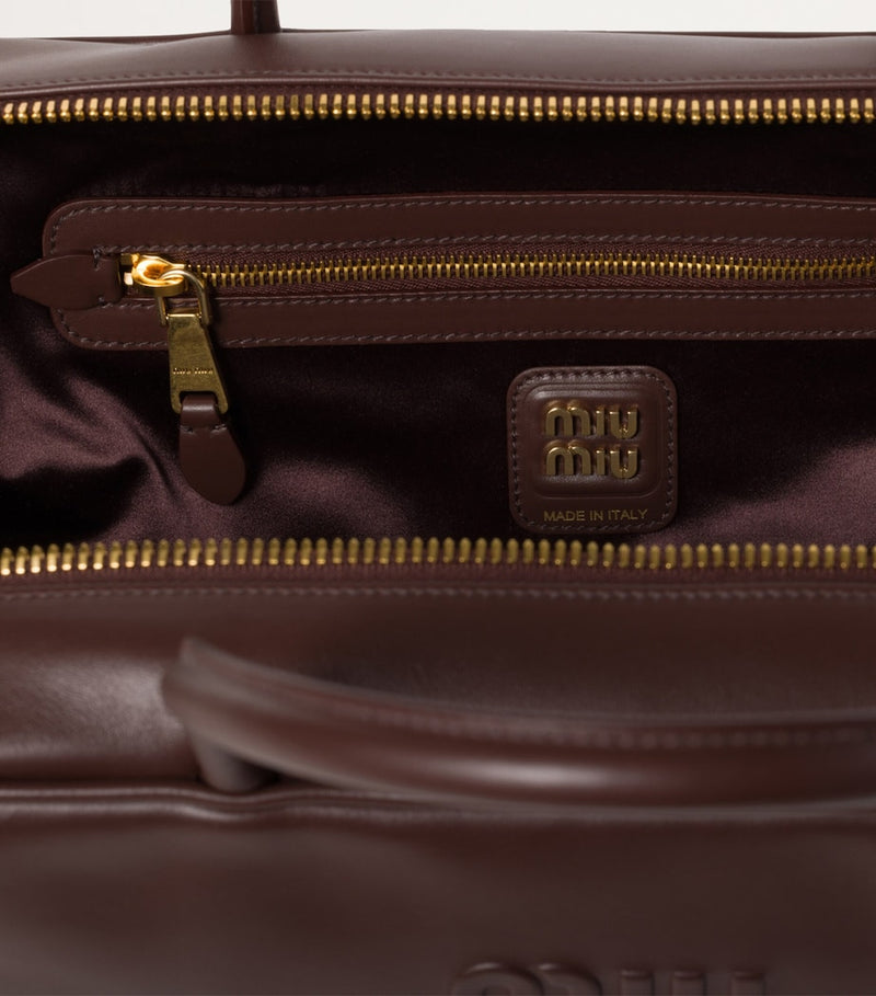 Miu Miu Beau top-handle bag in Italian calfskin leather, imported from the UK