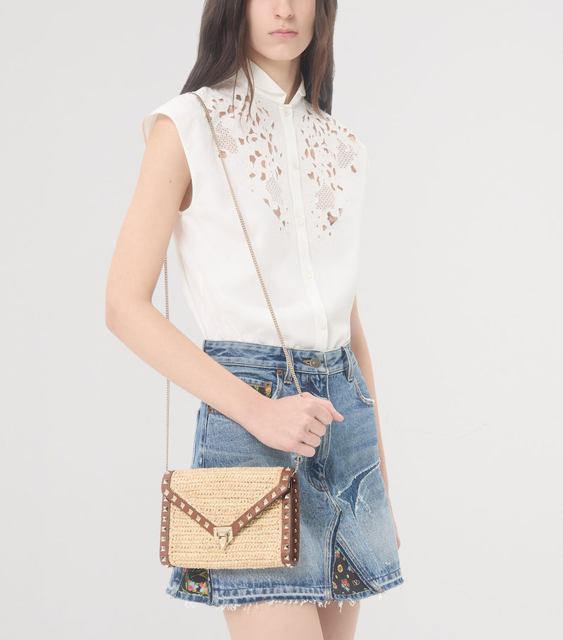 Valentino Garavani mini straw Rockstud cross-body bag - British product