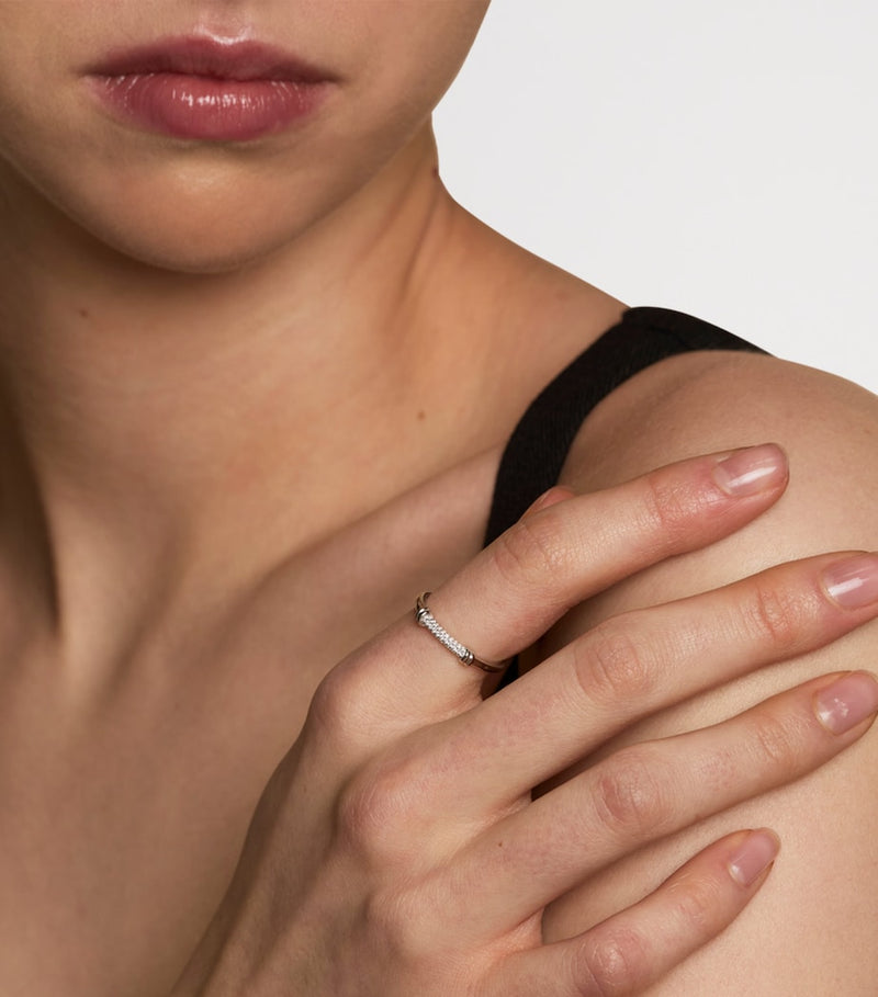 Astrid & Miyu rhodium-plated pavé knot ring (British brand)
