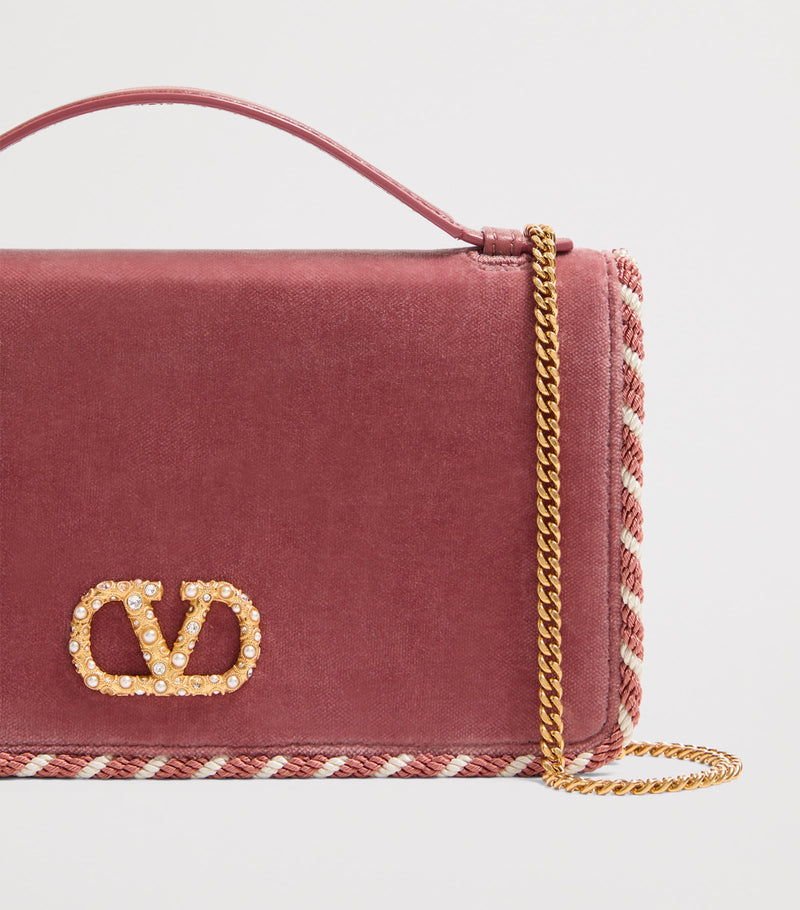 Valentino Garavani VLogo Signature wallet with strap (British brand)