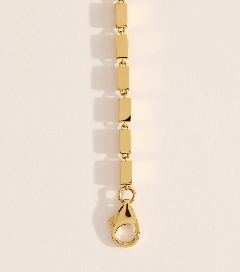 Suzanne Kalan yellow gold block-chain ID bracelet, imported from the UK