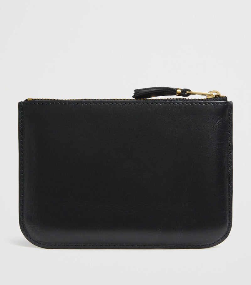 Comme des Garçons medium leather logo wallet, UK version