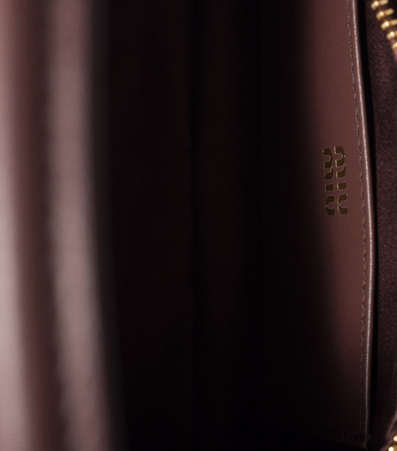 Miu Miu padded leather pouch adjustable strap UK version