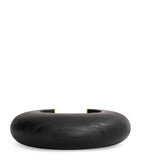 Alaïa wood and brass bumper cuff, imported from the UK