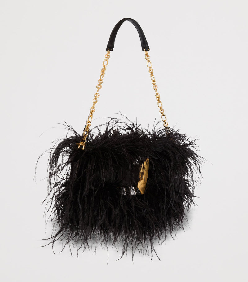 Balmain Anthem clutch bag with long fibres and gold buckle, imported from the UK